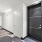 Interior white hallways with front doors to apartments