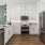 Kitchen with white cabinets and stainless steel appliances