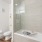 Bathroom with toilet and glass shower/tub combo