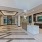 Interior of Leasing Office with Concierge Desk and Two Elevators