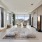 a room with a rug and a couch and a rug
