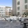 a group of tables and chairs outside